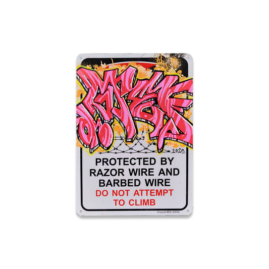 Security metal sign with red and pink graffiti style writing