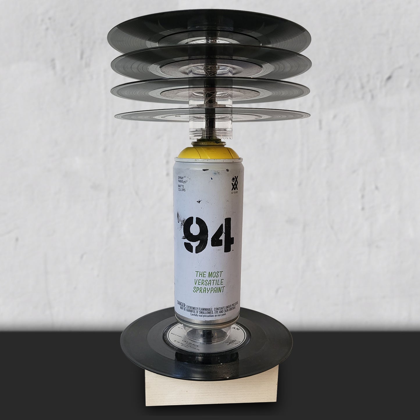 Decorative LED table lamp with 45 vinyl records and empy 94 can