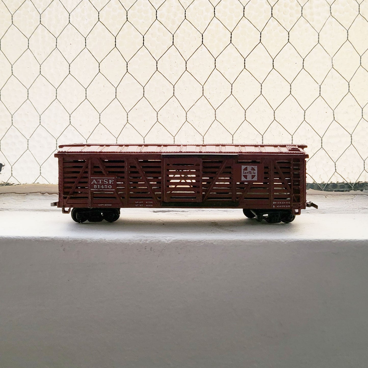 HO model toy 'Santa Fe ATSF 51410' train boxcar for graffiti writer gifts and train enthusiasts. 