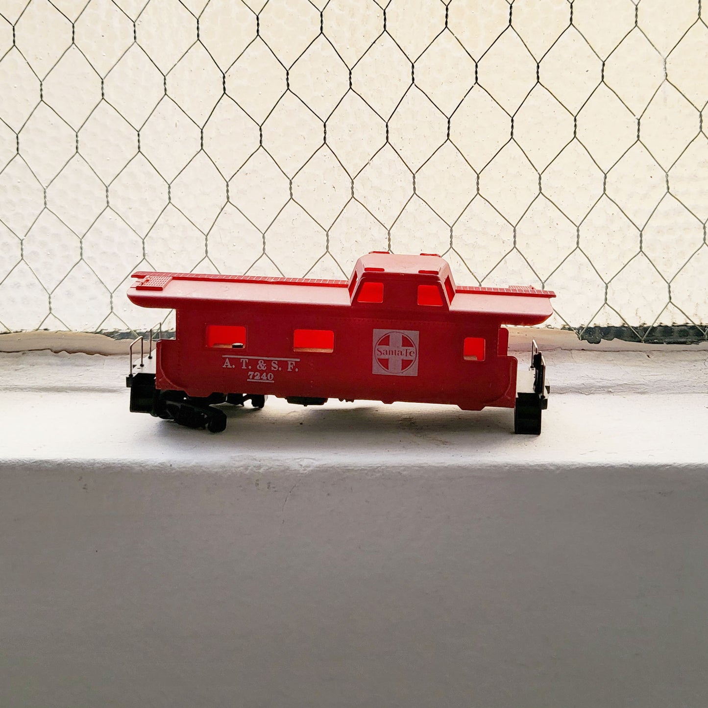 HO model toy 'Santa Fe AT&SF 7240' train caboose for graffiti writer gifts and train enthusiasts. 