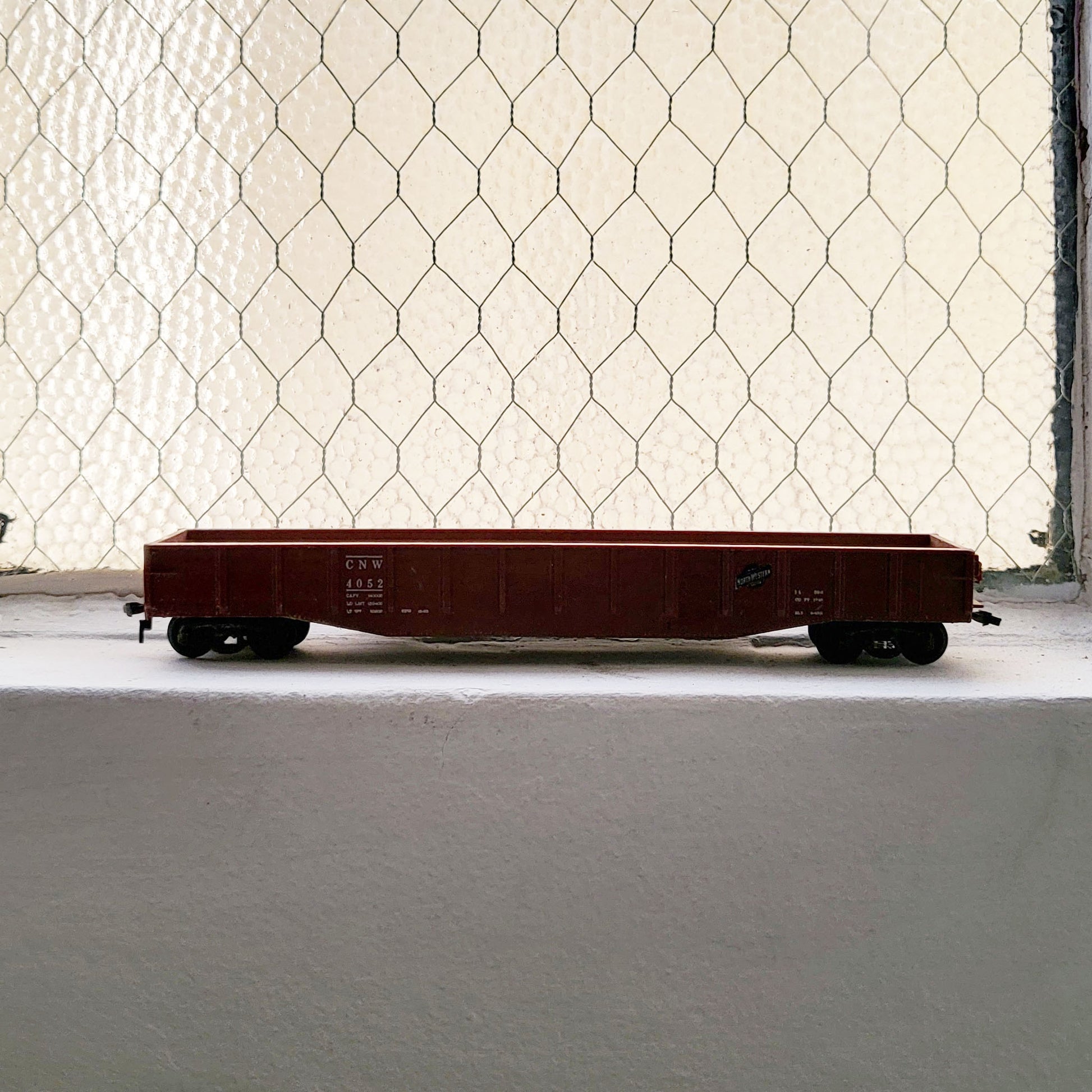 HO model toy 'C N W' train flatcar for graffiti writer gifts and train enthusiasts. 