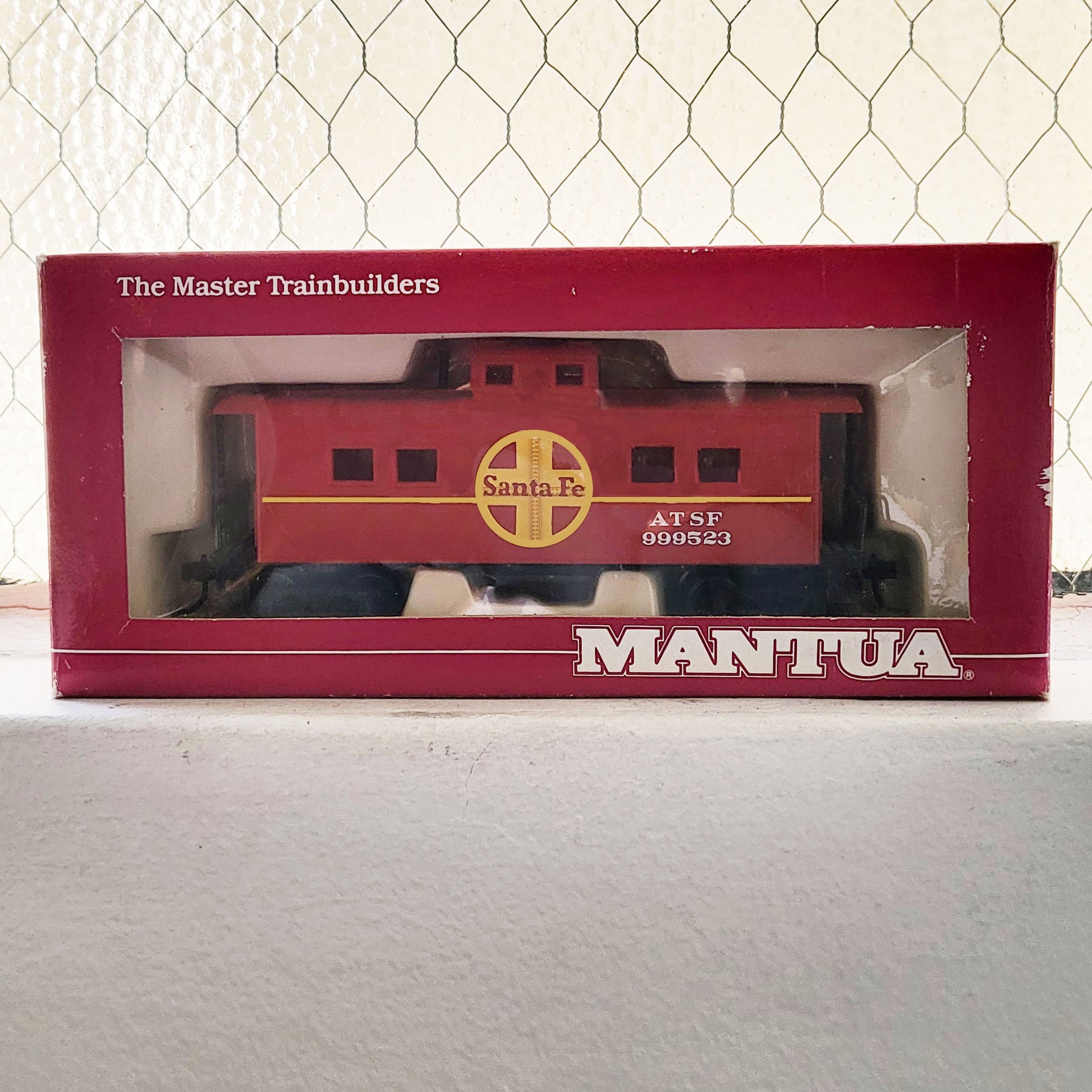 HO model toy 'Santa Fe Mantua' train caboose for graffiti writer gifts and train enthusiasts. 