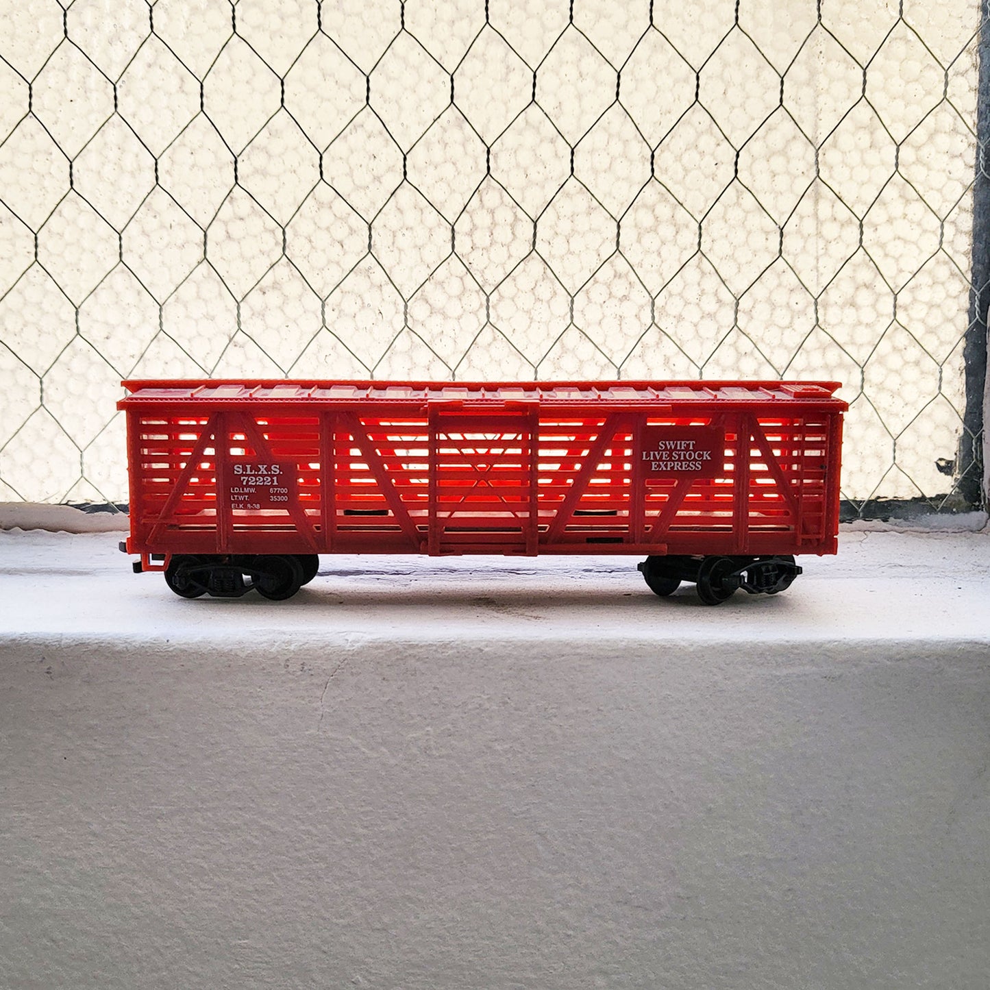 HO model toy 'Swift Livestock' train boxcar for graffiti writer gifts and train enthusiasts. 