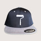 Phatcaps graffiti brand  black and grey cap paint roller with white embroidery.