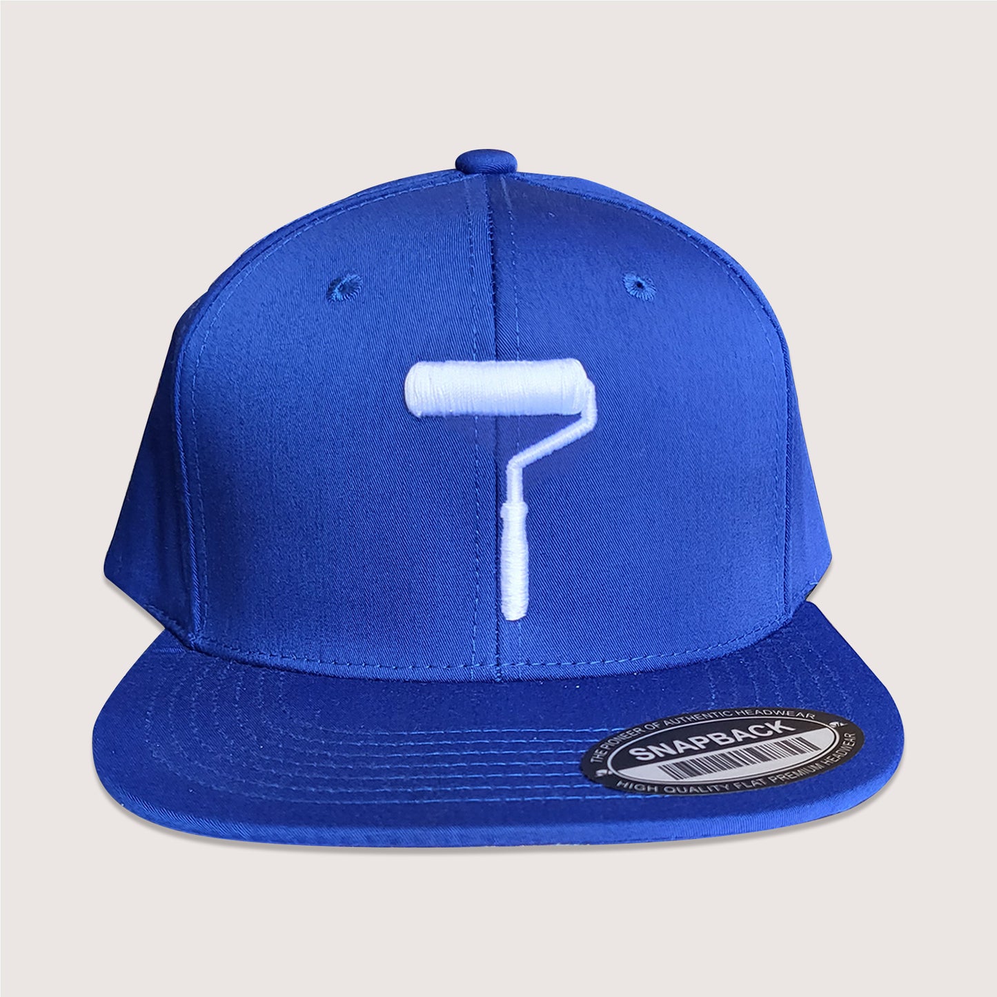 Phatcaps graffiti brand dodger blue baseball cap paint roller with white embroidery.