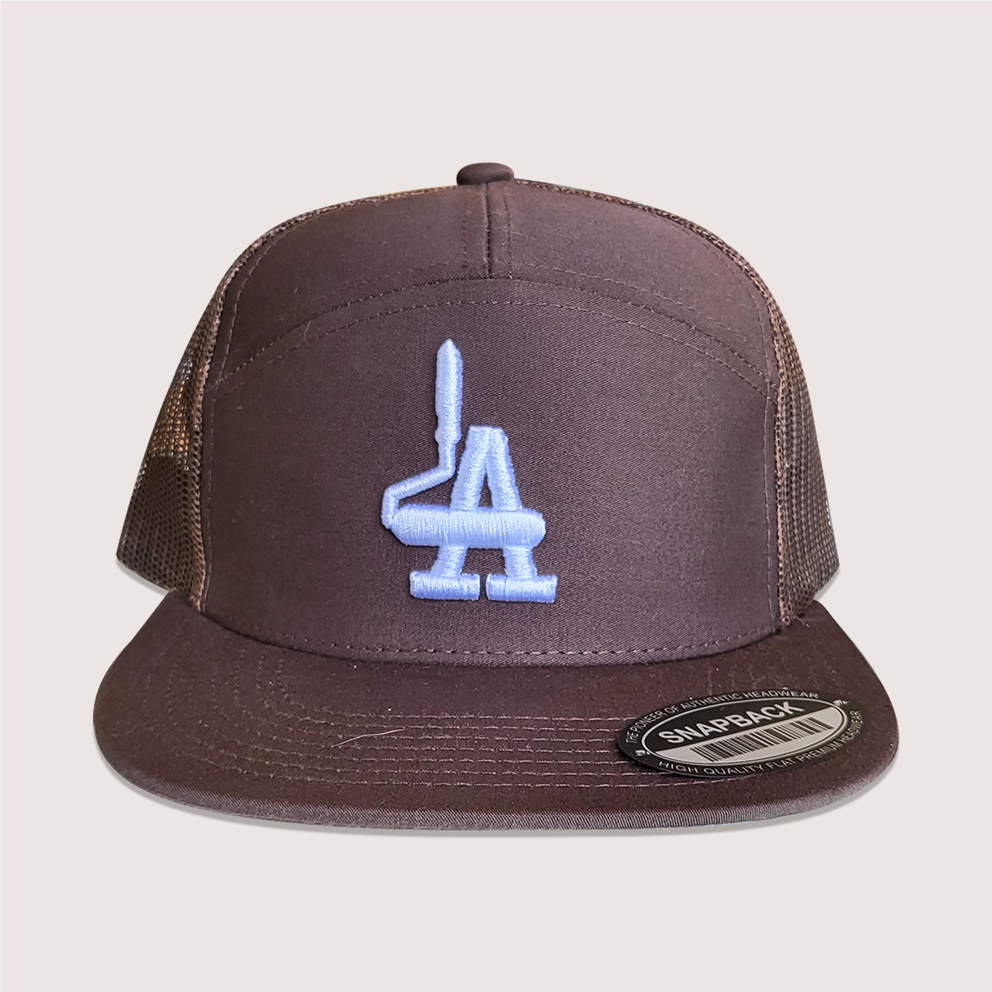 Phatcaps graffiti brand paint roller LA 7 panel trucker cap in brown.